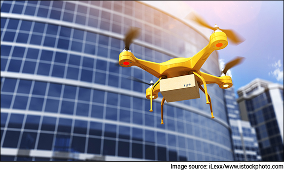 Quadrocopter carrying a parcel